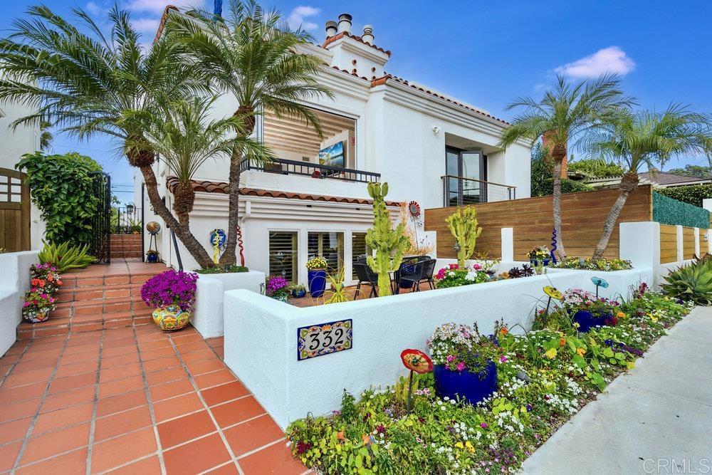 332 Gravilla Street La Jolla, CA 92037 - Photo 2 of 49 a front view of a house with a yard