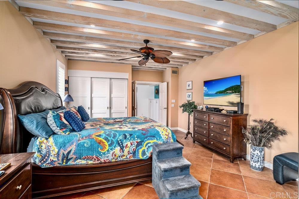 332 Gravilla Street La Jolla, CA 92037 - Photo 26 of 49 a living room with furniture and a flat screen tv