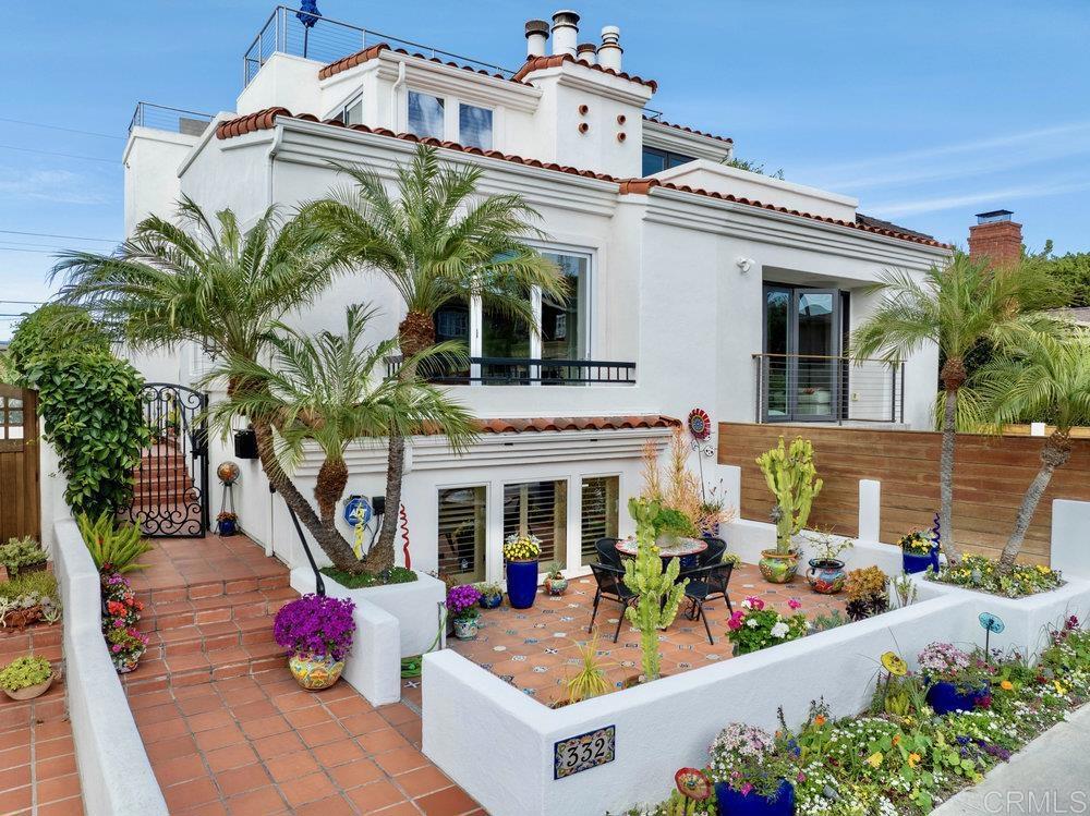 332 Gravilla Street La Jolla, CA 92037 - Photo 3 of 49 front view of a house with a potted plant
