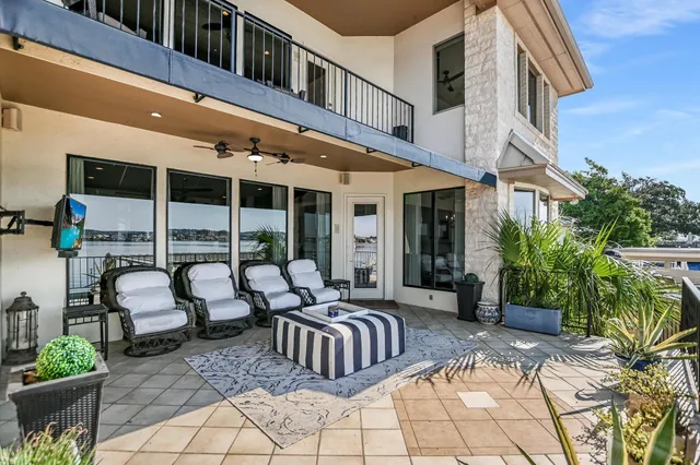 a view of balcony with patio