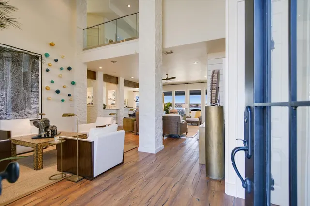 a view of a living room and dining room