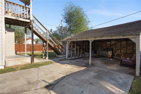 a house view with a backyard space