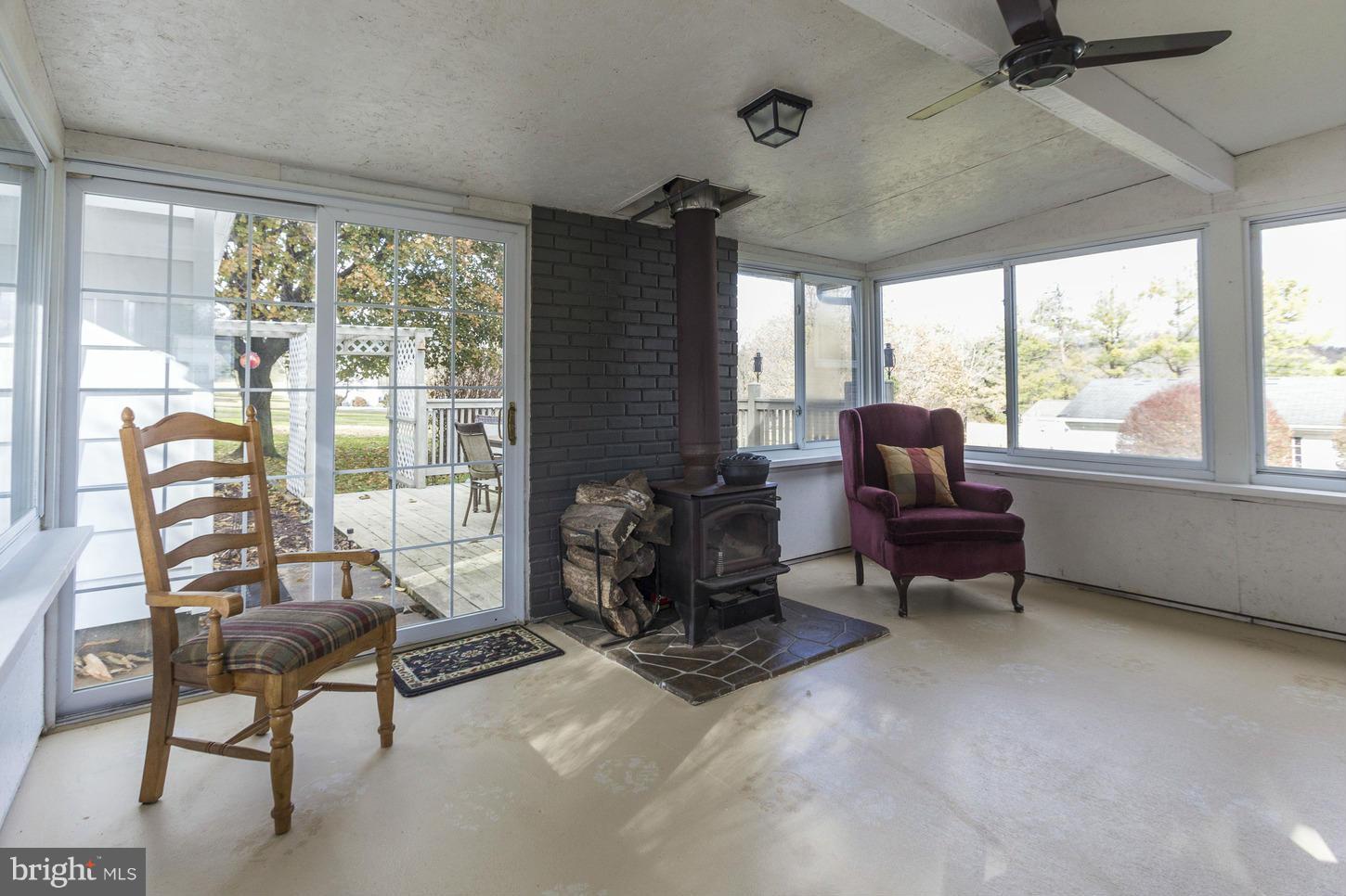 3114 Bird View Road Westminster, MD 21157 - Photo 9 of 20 Sun Room w/ Wood Stove