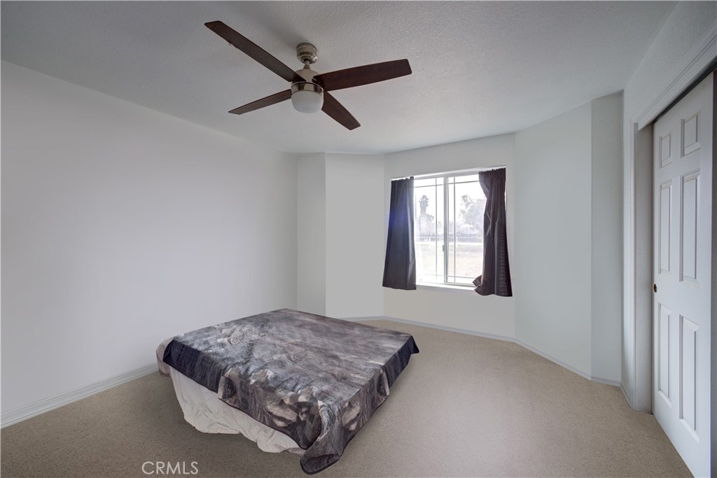 4850 Jardine Road Paso Robles, CA 93446 - Photo 14 of 19 a living room with a bed furniture and a window