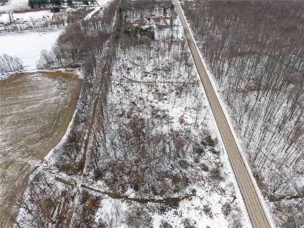 a view of a yard from a balcony