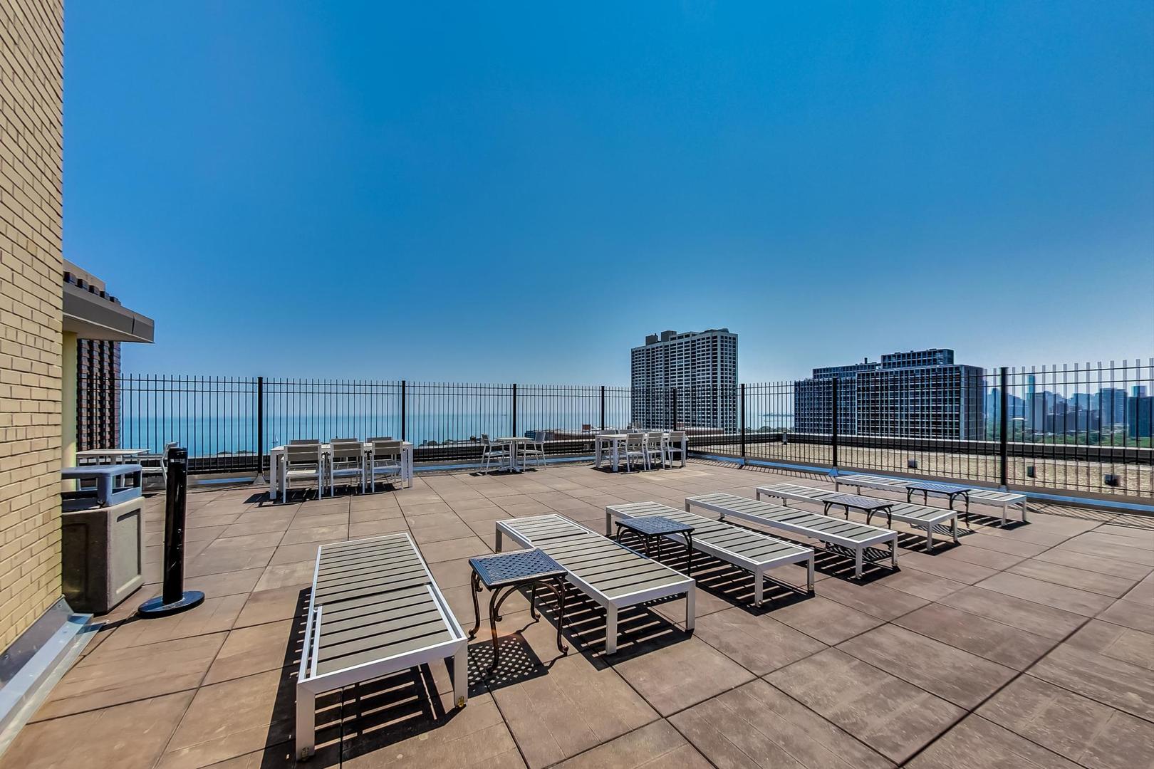 2930 North Sheridan Road, Unit 802 Chicago, IL 60657 - Photo 17 of 30 a view of a patio with swimming pool