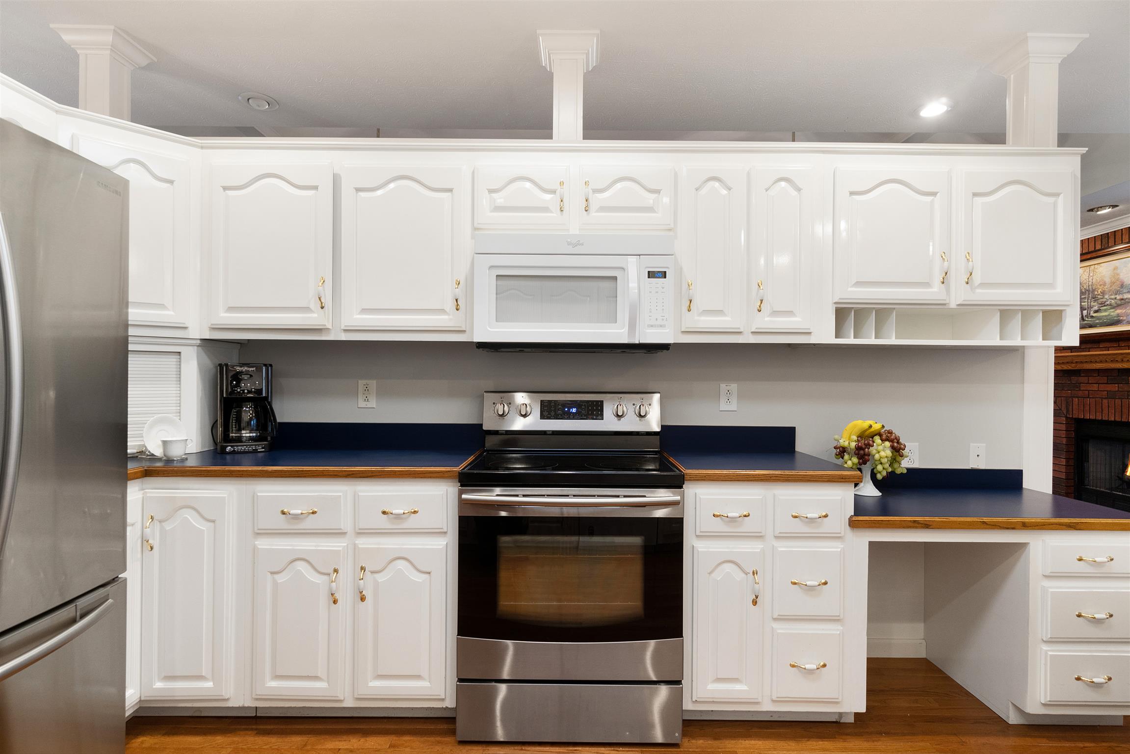 1712 Mosley Ferry Road Pleasant View, TN 37146 - Photo 13 of 30 Clean white cabinets compliment a variety of decor styles.