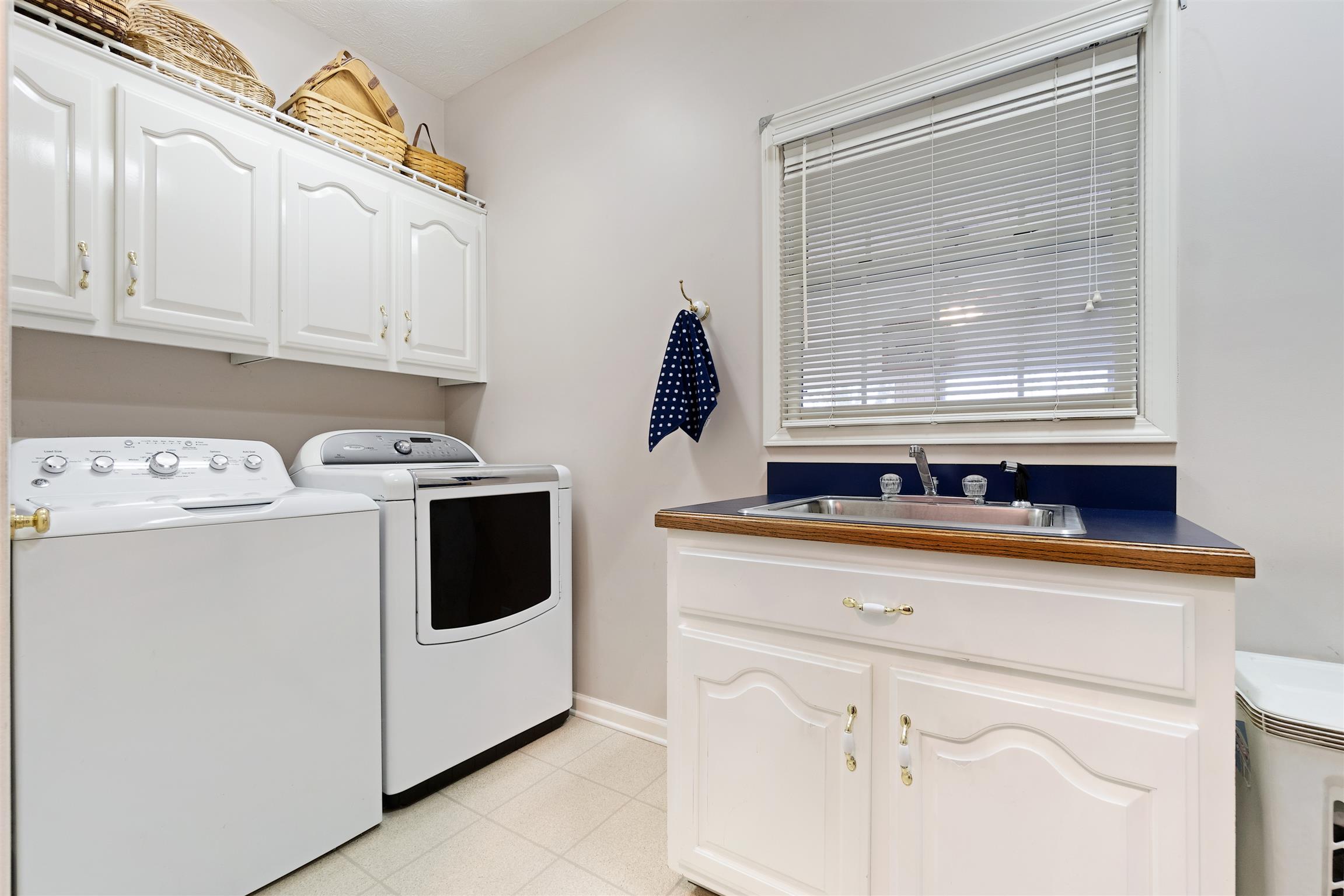 1712 Mosley Ferry Road Pleasant View, TN 37146 - Photo 27 of 30 Laundry room with plenty of space and storage.