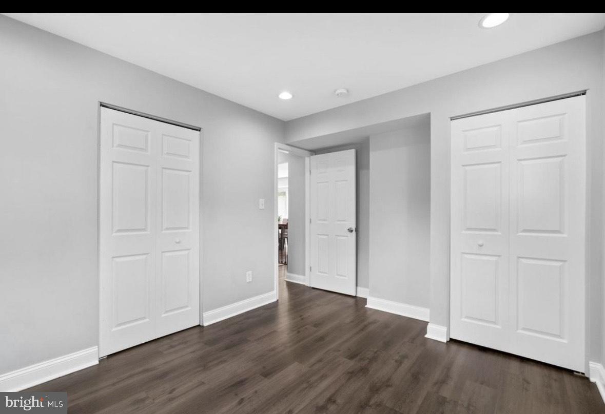 9802 Cherry Tree Lane Silver Spring, MD 20901 - Photo 22 of 33 a view of empty room with wooden floor