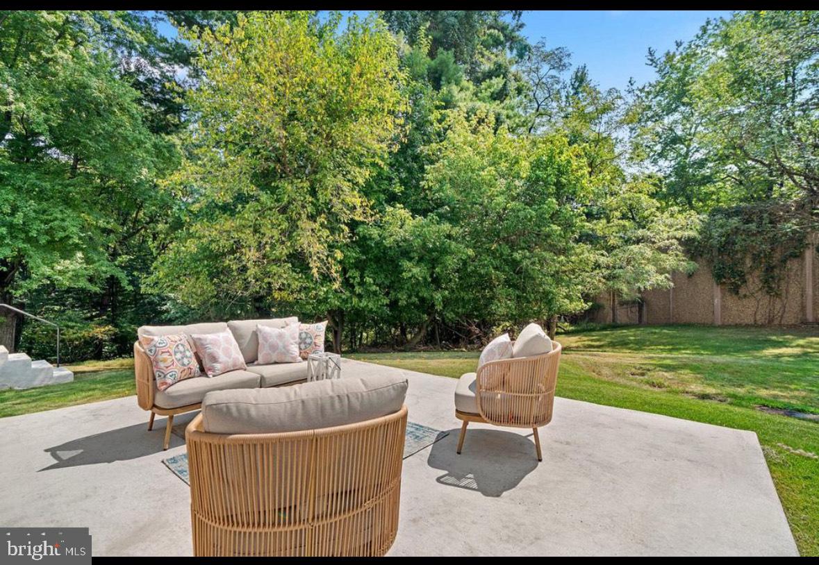 9802 Cherry Tree Lane Silver Spring, MD 20901 - Photo 30 of 33 a garden view with a seating space