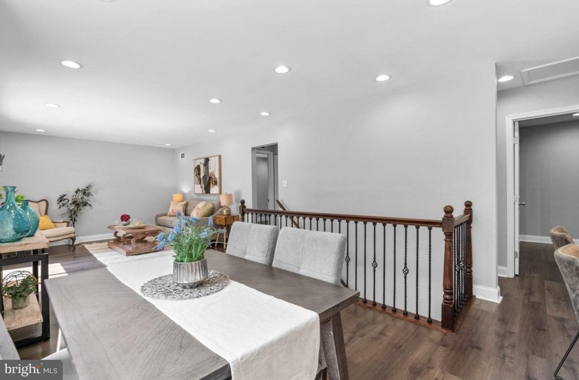9802 Cherry Tree Lane Silver Spring, MD 20901 - Photo 7 of 33 a view of a dining room with furniture