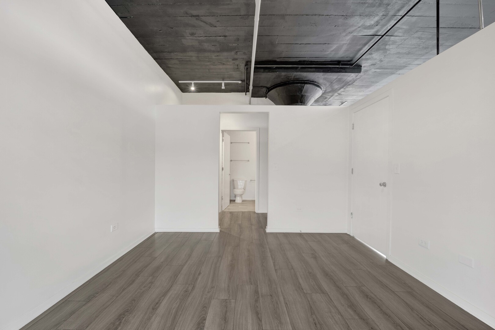 1524 South Sangamon Street, Unit 401 Chicago, IL 60608 - Photo 18 of 55 a view of small space with wooden floor