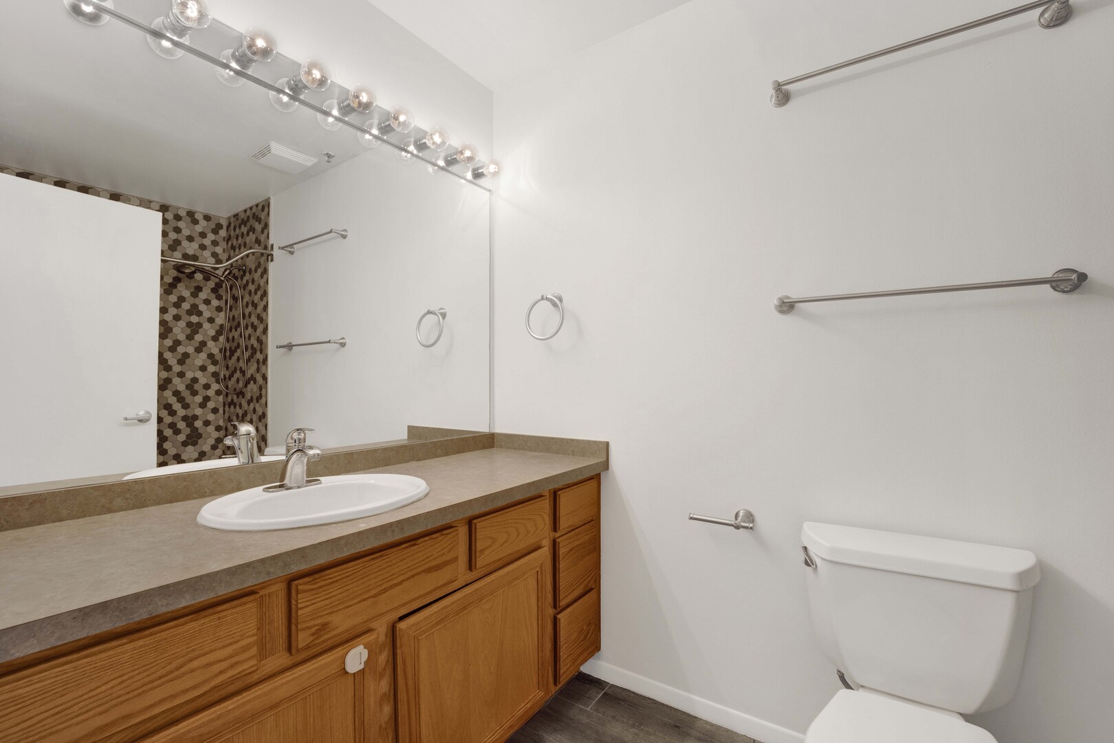 1524 South Sangamon Street, Unit 401 Chicago, IL 60608 - Photo 20 of 55 a bathroom with a sink and a mirror