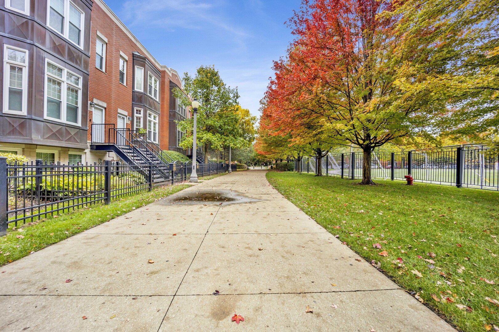 1524 South Sangamon Street, Unit 401 Chicago, IL 60608 - Photo 29 of 55 a view of a building with a yard