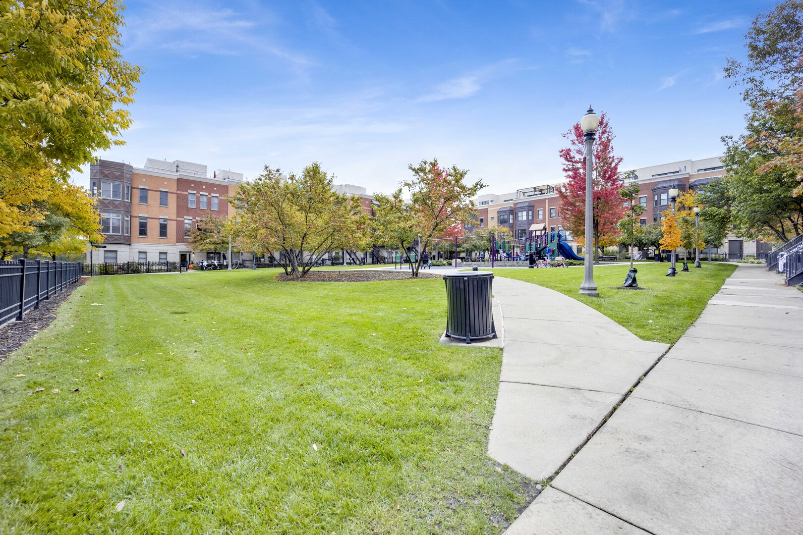 1524 South Sangamon Street, Unit 401 Chicago, IL 60608 - Photo 34 of 55 a front view of a building with garden