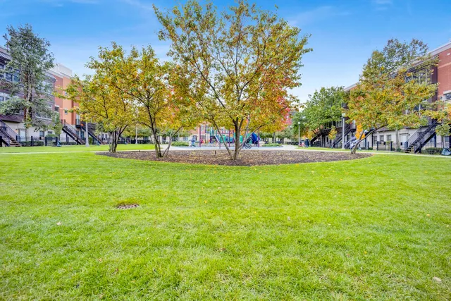 a view of street with parked cars