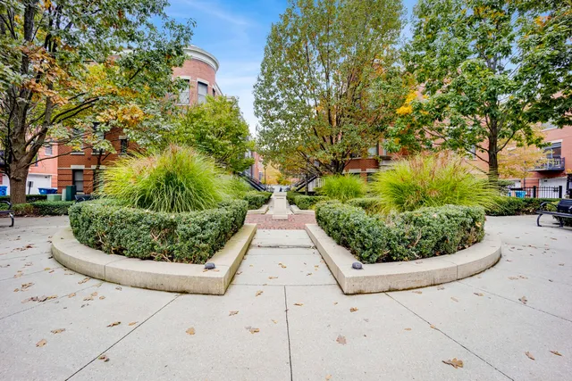 a view of a building with a yard