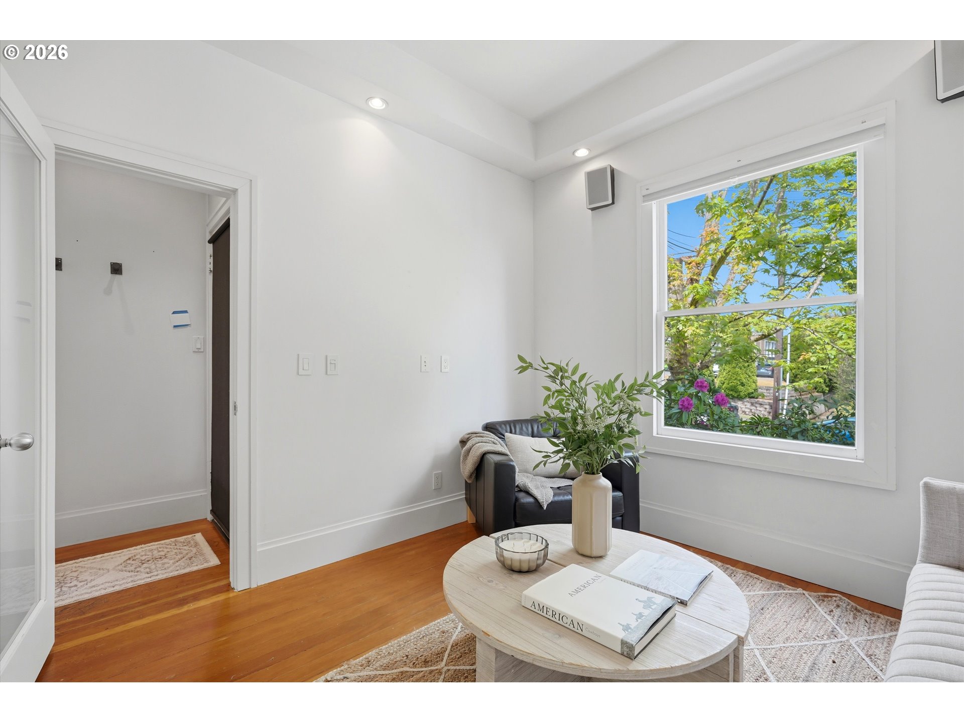 0322 Southwest Whitaker Street Portland, OR 97239 - Photo 11 of 39 a living room with furniture and a potted plant