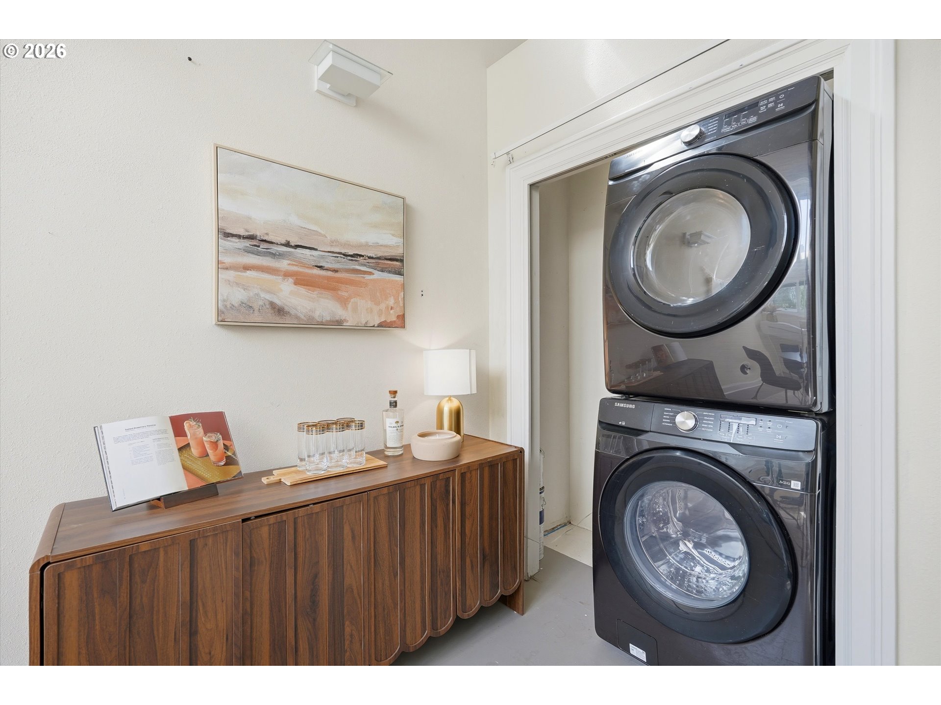 0322 Southwest Whitaker Street Portland, OR 97239 - Photo 20 of 39 a view of a room with washer and dryer