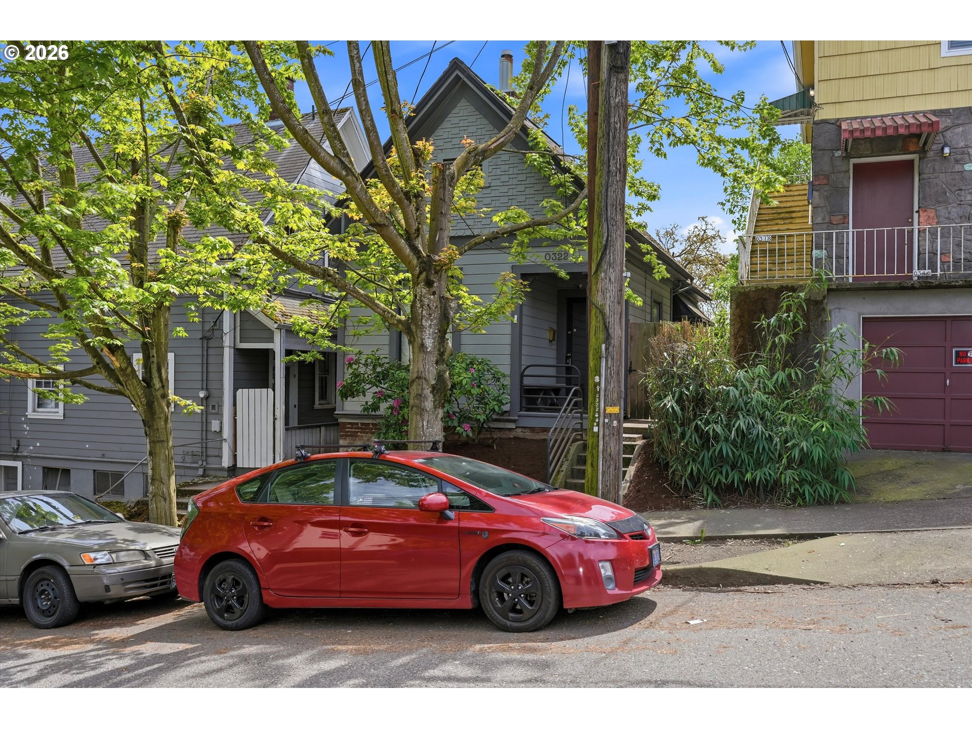 0322 Southwest Whitaker Street Portland, OR 97239 - Photo 4 of 39 a front view of a house with parking space