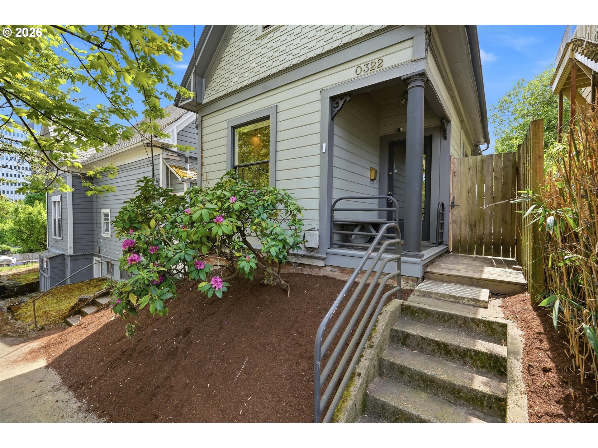 0322 Southwest Whitaker Street Portland, OR 97239 - Photo 5 of 39 a view of a house with a yard