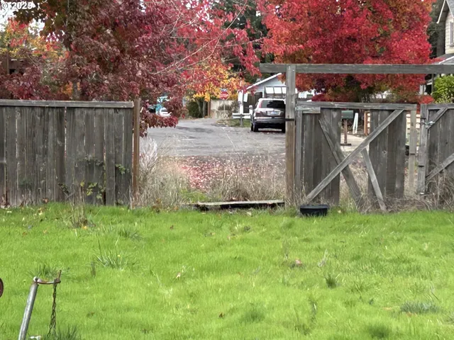 a view of outdoor space with deck and yard