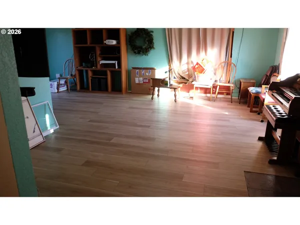 a room with furniture and a flat screen tv