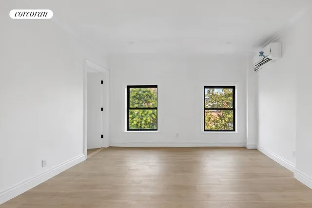 an empty room with windows