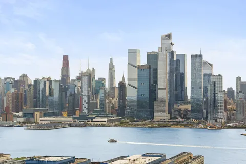 a view of a city with tall buildings