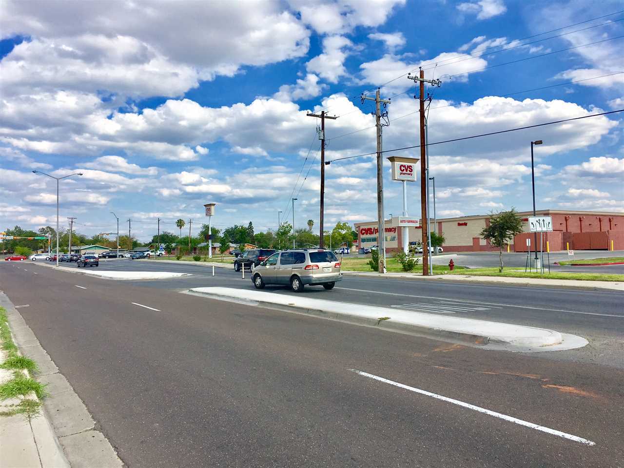 1016 East Calton Road Laredo, TX 78041 - Photo 11 of 12 a view of a street with a cars parked on the road