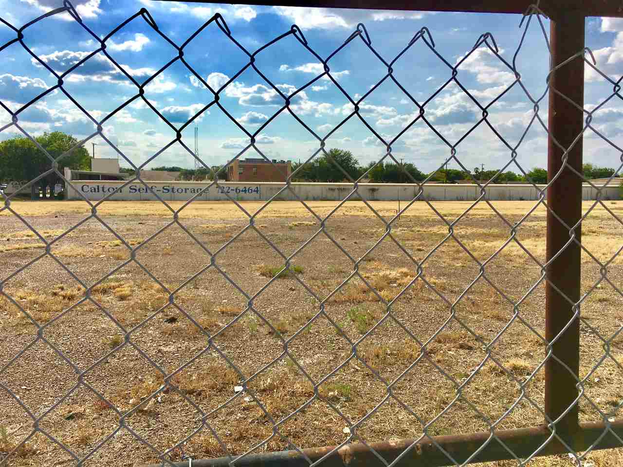 1016 East Calton Road Laredo, TX 78041 - Photo 6 of 12 a bathroom with a white wall and a shower curtain