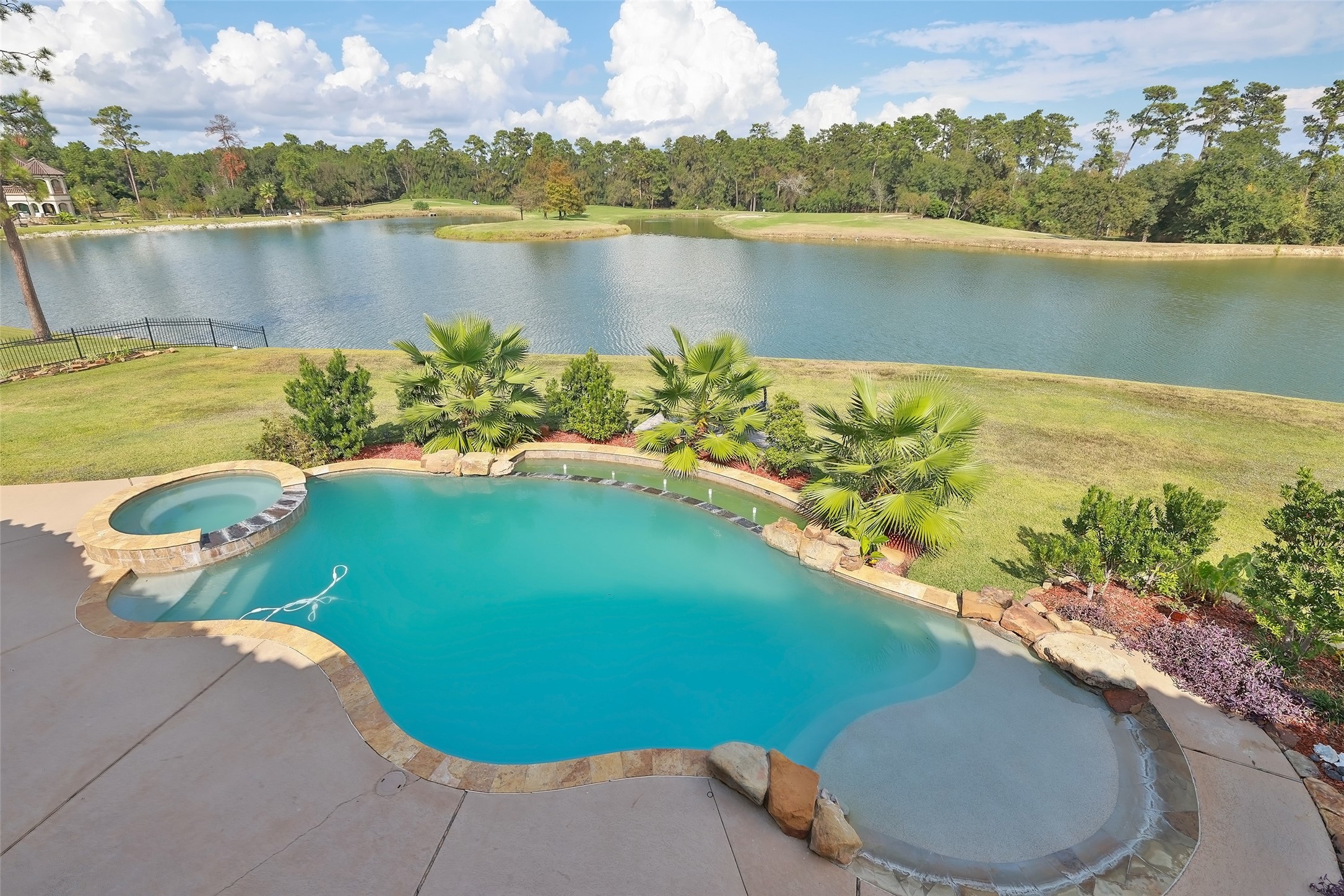 22 Post Shadow Estate Drive Spring, TX 77389 - Photo 2 of 50 a view of a lake from a balcony