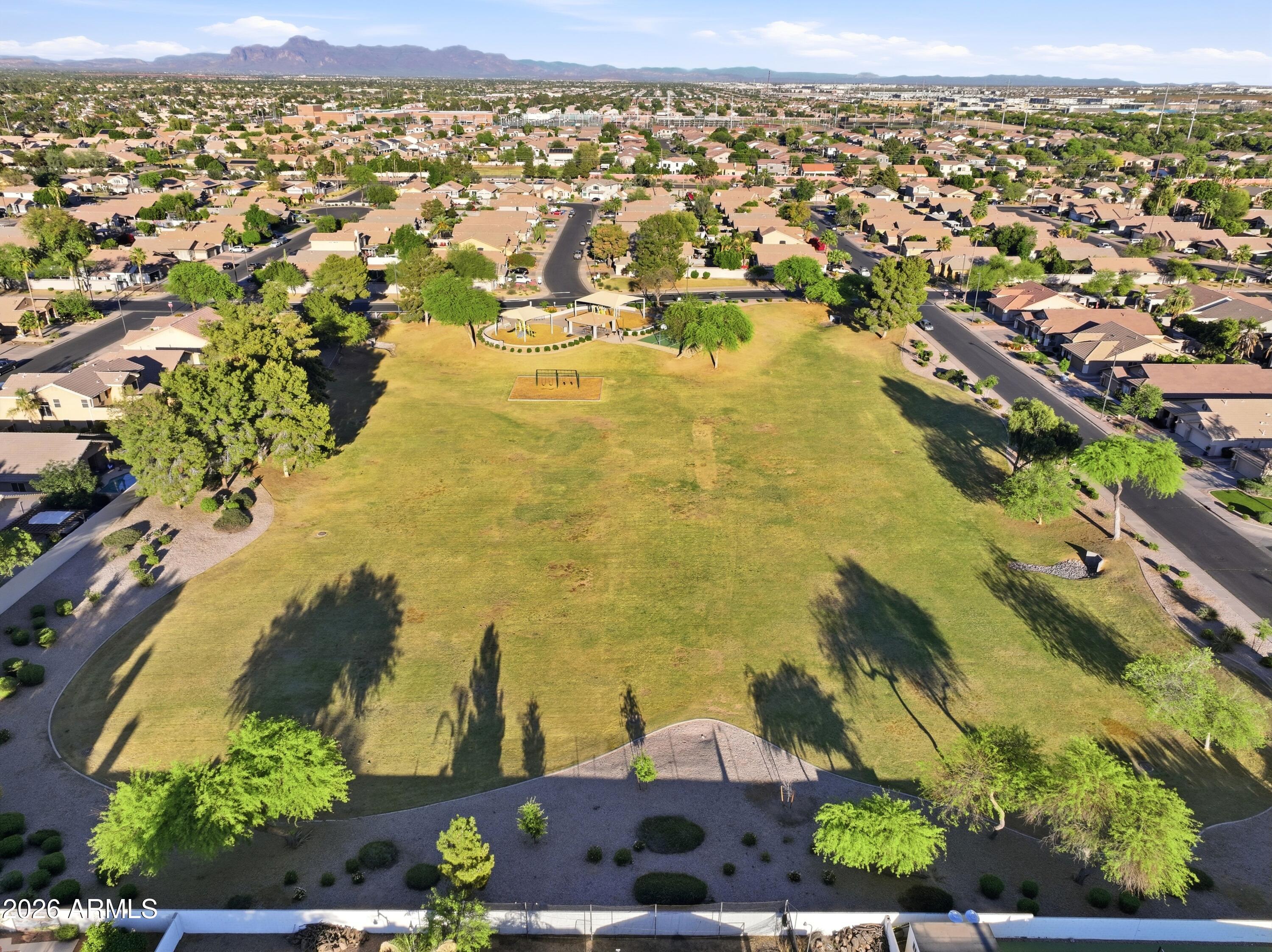661 North Joshua Tree Lane Gilbert, AZ 85234 - Photo 44 of 47 an aerial view of residential houses with outdoor space