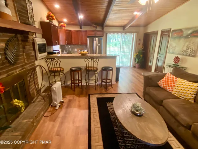 a bedroom with a bed and a mirror