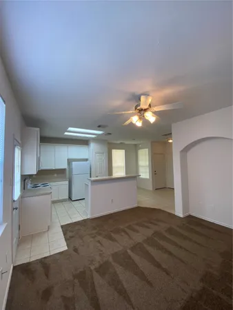 a view of a kitchen with a sink and a cabinets