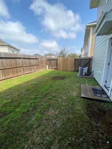 a view of a garden with an outdoor space