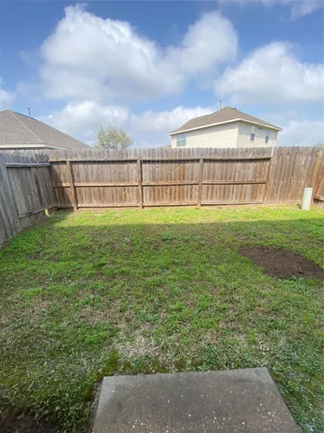 a view of a garden with a big yard