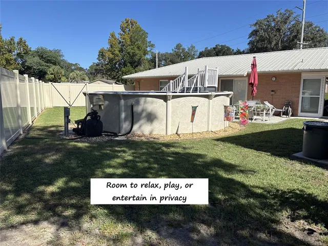 a view of a couches in a backyard