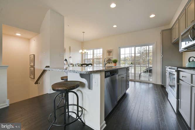 56 A Iron Gate Road Sicklerville, NJ 08081 - Photo 5 of 30 Bright and inviting modern kitchen space.