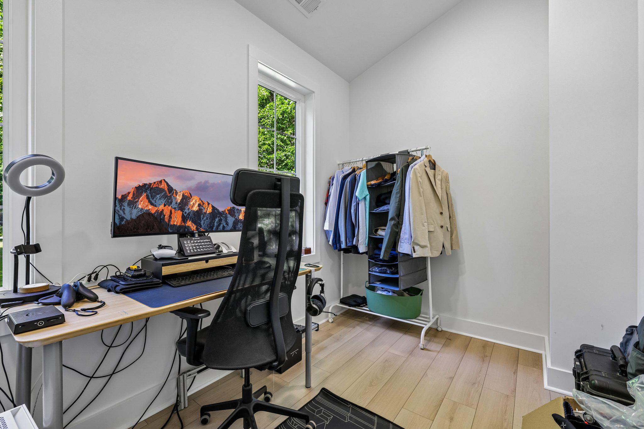 4315 Pinetree Road Rockville, MD 20853 - Photo 18 of 28 a view of a workspace with furniture and gym equipment