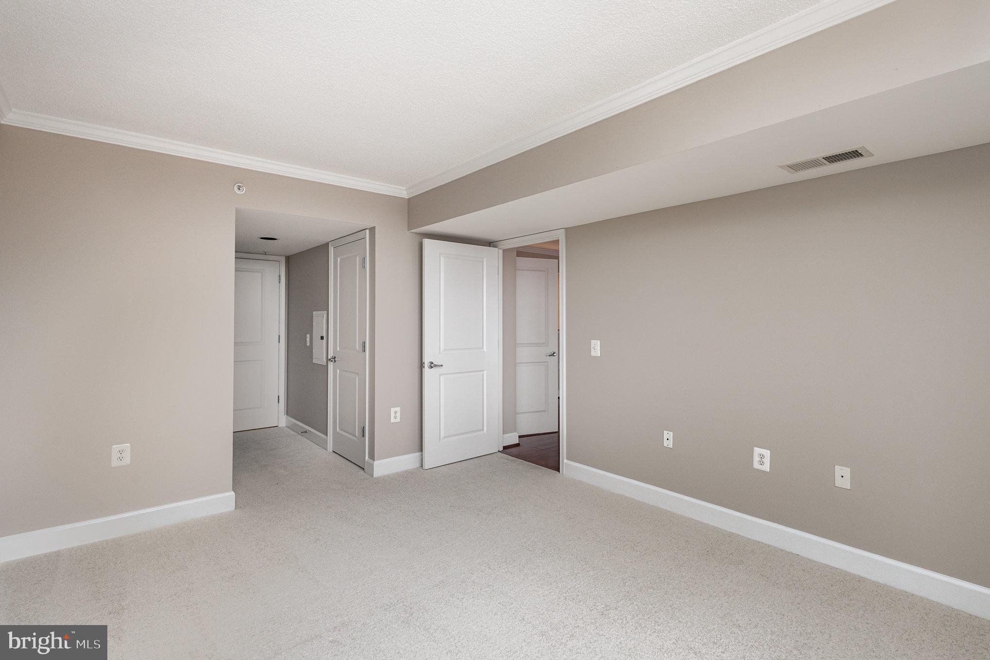 11800 Sunset Hills Road, Unit 619 Reston, VA 20190 - Photo 19 of 39 leading to dressing area and bathroom
