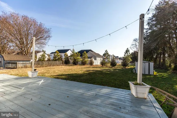 a view of a patio with a yard