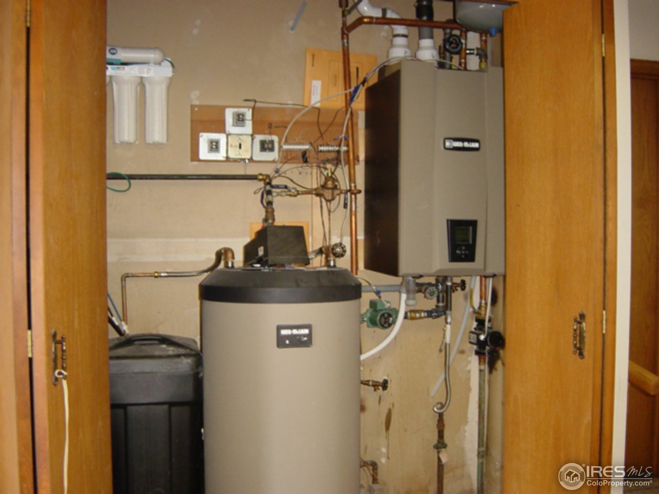 1703 Robin Road Sterling, CO 80751 - Photo 19 of 24 Softener & Boiler