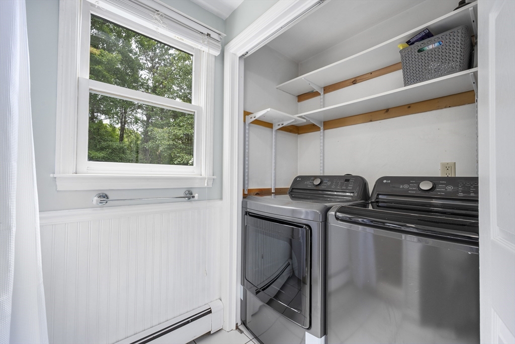 52 Mill Road East Sandwich, MA 02537 - Photo 16 of 36 a kitchen with a stove and a window