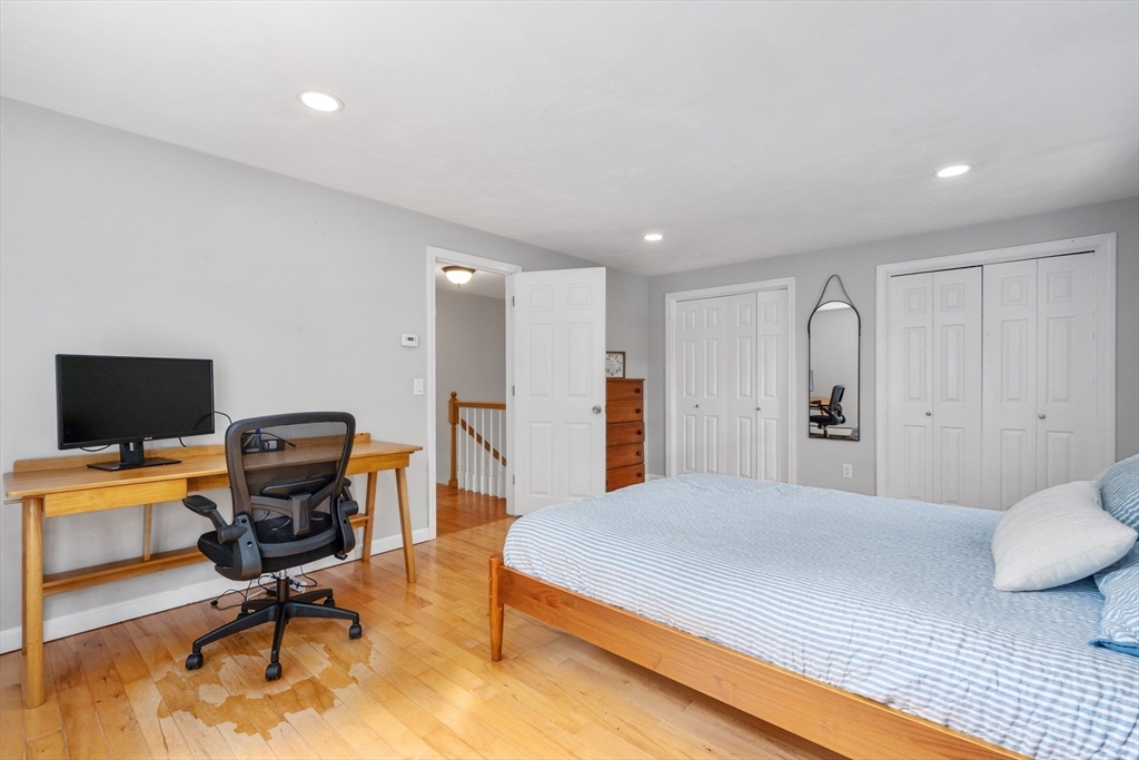 52 Mill Road East Sandwich, MA 02537 - Photo 21 of 36 a bedroom with a bed and chair