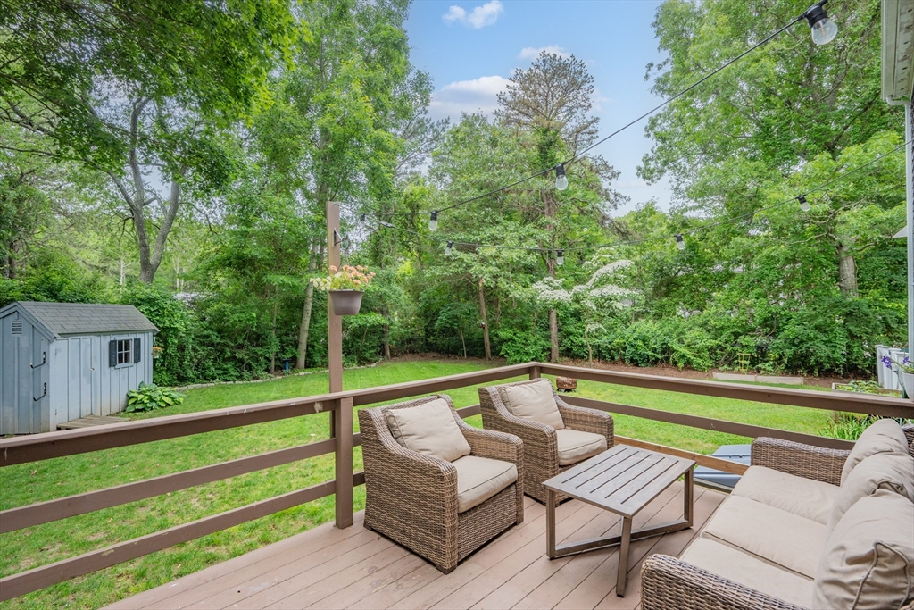52 Mill Road East Sandwich, MA 02537 - Photo 34 of 36 a view of a couches in a patio