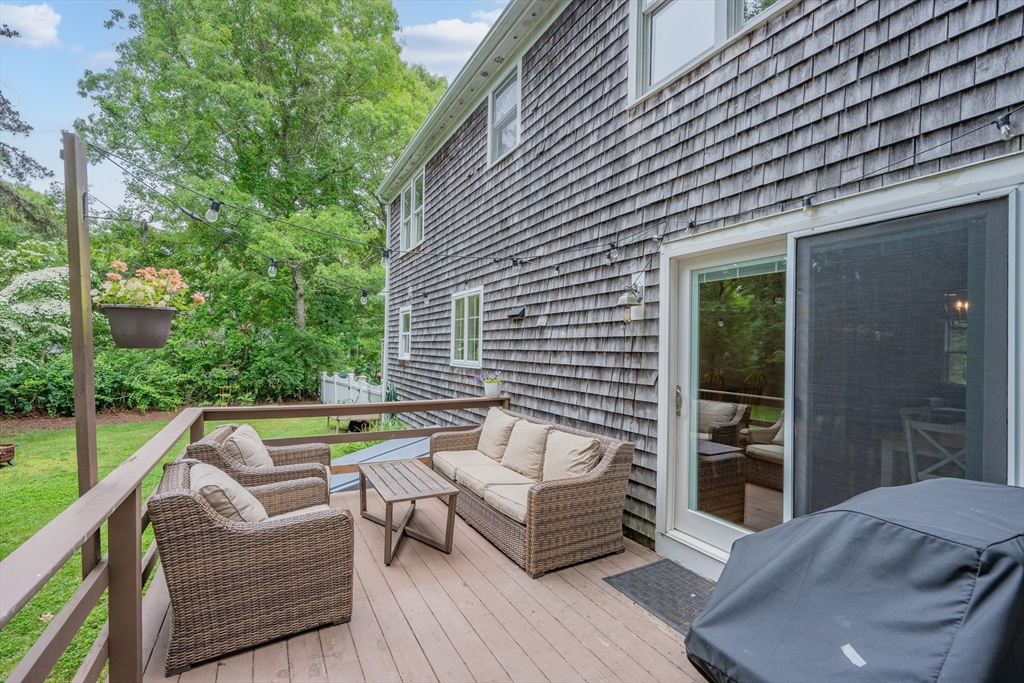 52 Mill Road East Sandwich, MA 02537 - Photo 35 of 36 a view of house with outdoor seating space