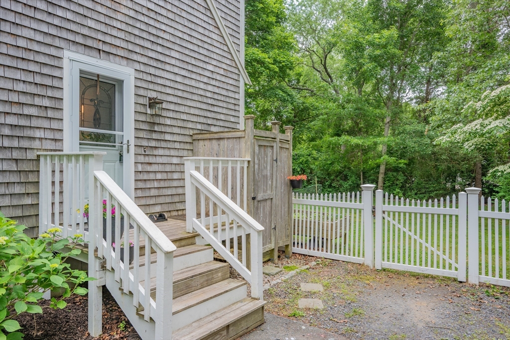 52 Mill Road East Sandwich, MA 02537 - Photo 5 of 36 a view of a balcony with staircase