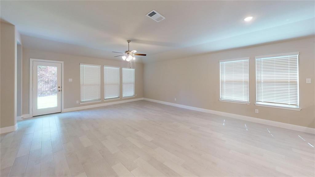1420 Elizabeth Street Anna, TX 75409 - Photo 3 of 18 a view of an empty room with a window