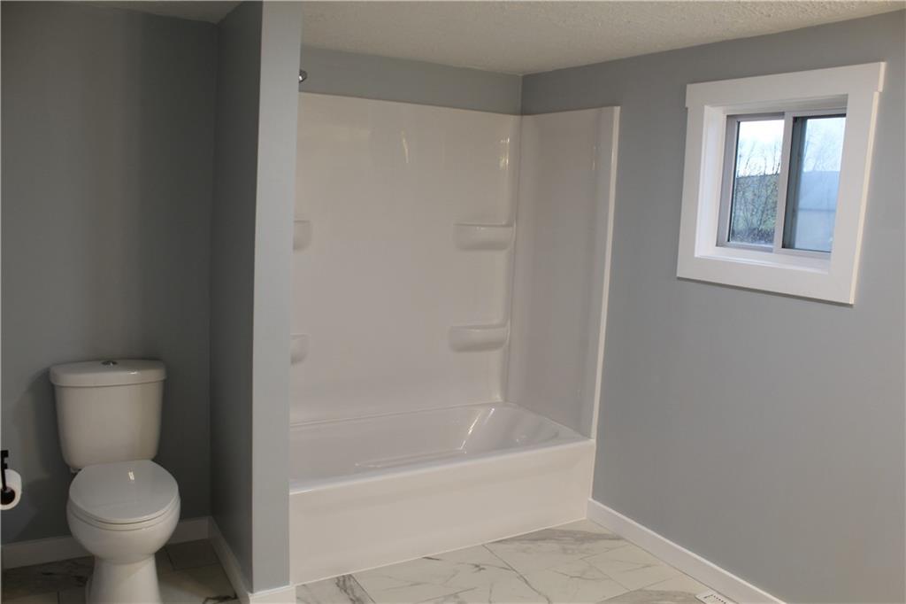 73 Beham Ridge Road West Alexander, PA 15376 - Photo 13 of 20 a bathroom with a toilet and a bathtub